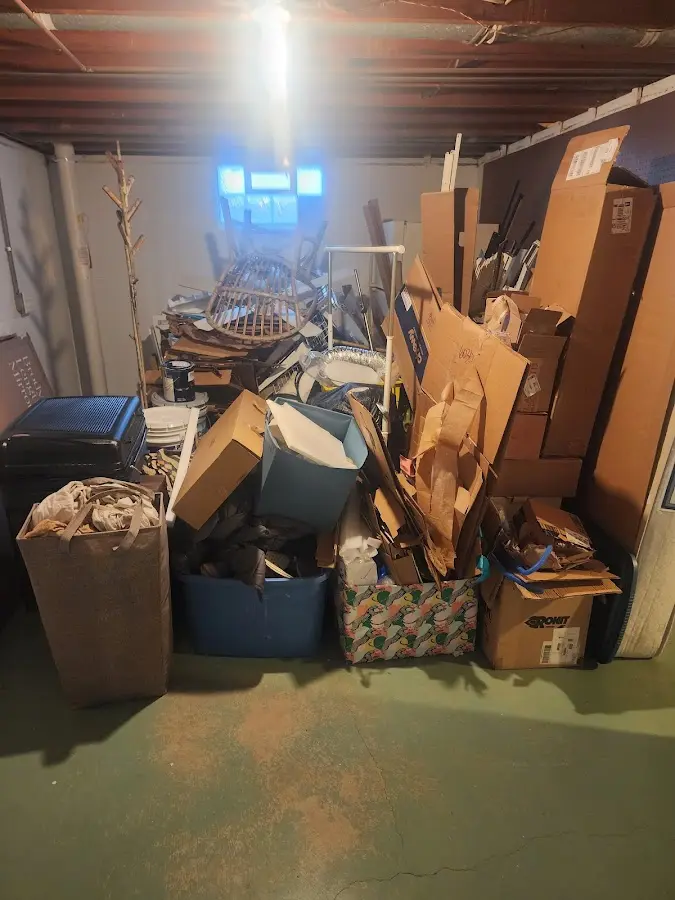 Roll-off dumpster container at job site for 6 Yard Dumpster Rental in Annandale